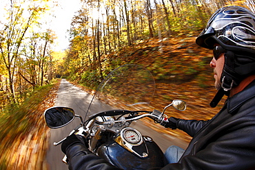 POV shot of motorcycle ride in autumn