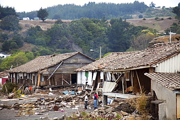 Houses are destroyed in Curanipe, Chile after an 8.8 earthquake and subsequent tsunami struck this coastal town.