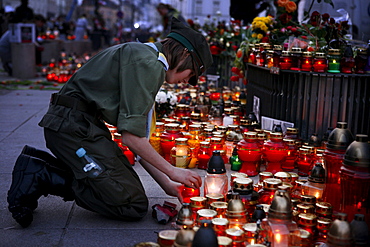 Mourners gather in Warsaw following the death in an airplane crash in Russia of the Polish president Lech Kaczynski, his wife and over ninety other high ranking government, military, civic and religious leaders.