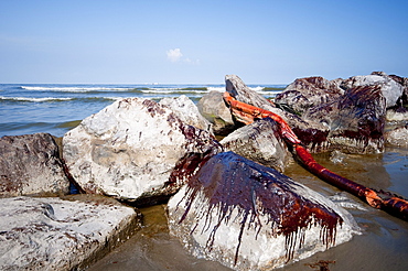 Oil splashed up over the jetty on Grand Isle State Park. The jetty along Barataria pass.