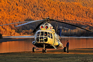 Helicopter delivers guests to fly fishing camp in Mongolia.