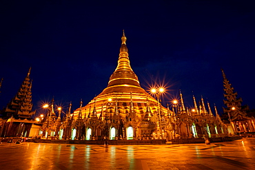 SHWEDAGON IN YANGON   'The Golden Dragon' is the most sacred of all Buddhist sites in the country. The golden dome rises 98m above the base. According to legend the stupa dates back 2500 years, in it's current form it dates back to 1769.