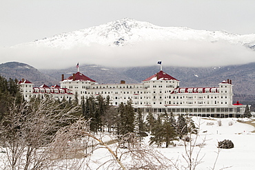 The snowcapped Presidential Range behind the Mount Washington Hotel.