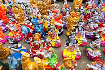 Hindu god figures on a market stall, Haridwar, India.