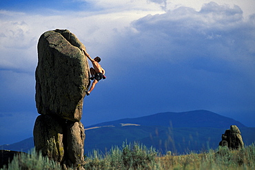 Alek Tkach bouldering in Whiskey Gulch, Montanta.