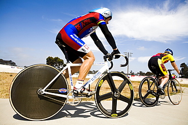 Track cyclists on a veladrome.