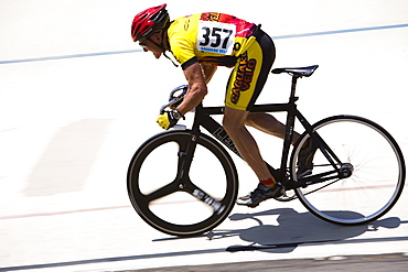 Track cyclists on a veladrome.