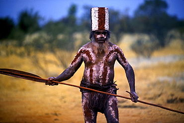 An Aboriginal elder dressed as a possum performs a traditional dance near Alice Springs, Australia.