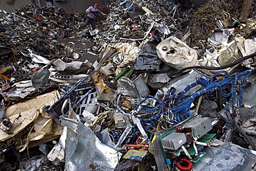 Taizhou Tongtian Electrical Appliance Co. Ltd., Fengjiang Disassembling Industrial Park, Taizhou City, Zhejiang Province, China.  Workers are sorting out scraps.