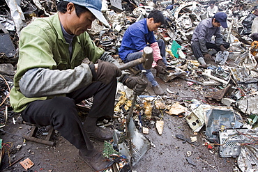 At the Taizhou Tongtian Electrical Appliance Co. Ltd., Taizhou City, Zhejiang Province, China workers are sorting out scrap metals.