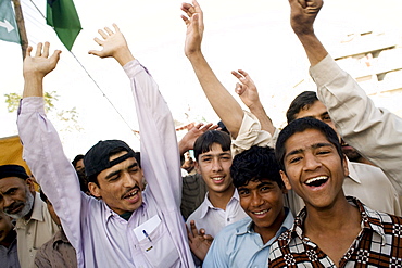 Pakistanis stage an informal rally in support of the PPP on election day in Karachi, Pakistan  on February 18, 2008.