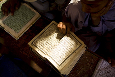 Young boys study the Koran at a madrassa in Karachi, Pakistan on February 1, 2008.