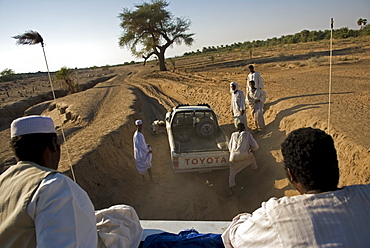 The region of the Fourth Cataract, the most impassable of all rapids of the Nile. Still today the water rapids cannot be crossed by any large boats making the region accessible only via a sandy and rocky desert track. The region is  among the most neglected areas in Northern Sudan. Apart from basic educational institutions virtually no public infrastructure such as tarred roads, bridges or ferry boats and hospitals exist.