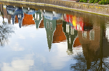 Reflections of houses in a canal, Alkmaar, Netherlands.