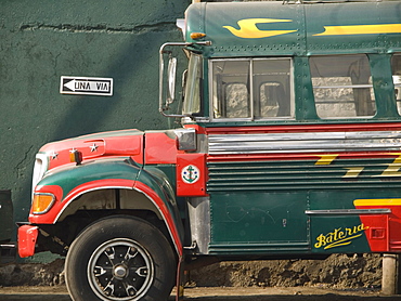 Former American school buses used now for inter city transport, at the bus station in Santiago Atitlan, Guatemala.