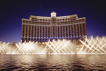 The Fountains of Bellagio peform in front of the Bellagio Hotel in Las Vegas, NV. Playing as often as every 15 minutes, the fountains are a popular destination for tourists. The Bellagio, one of Las Vegas' most expensive and newest hotels, opened for business in October 1999.