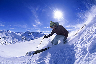 Woman skiing in Lech, Austria.