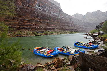 A sudden rain storm catches rafters on the Colorado River at the Grand Canyon in Arizona.