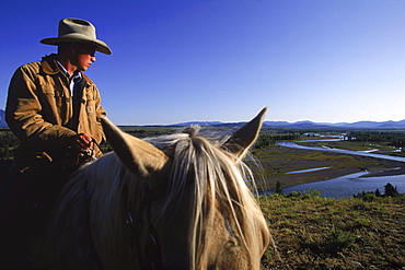 Trail rides out of Lost Creek Ranch with Snake River in background.