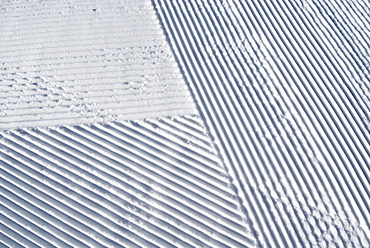 Snow patterns made from a grooming machine line the snow in Truckee, California.