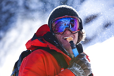 A portrait of a snowboarder in Colorado.