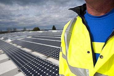 Portrait of a green energy business entrepreneur on a roof.