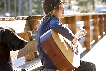 A boy plays guitar in Lake Tahoe, California.