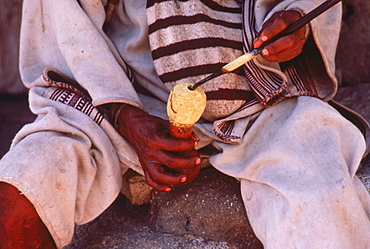 Lime-filled Poporo used by the Kogi when chewing coca leaves.