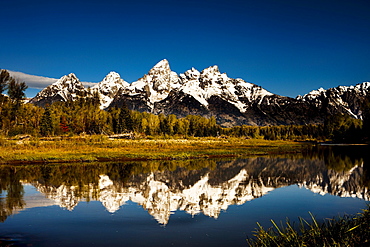 Grand Tetons in Jackson Hole Wyoming at sunrise.