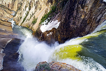 Lower Yellowstone Falls cascades into the valley below in Yellowstone National Park, Wyoming.