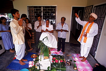 Hindustani celebration for 58th birthday of woman Dhanradjie Kalloe in Paramaribo, Suriname.