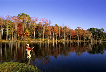 A person fly fishing in Pennsylvania.