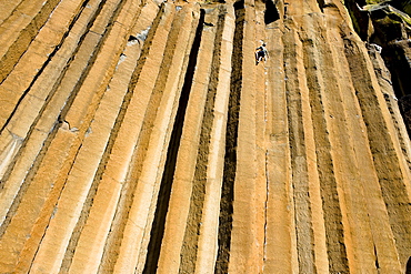 A mid adult man rock climbing at Trout Creek, Oregon.