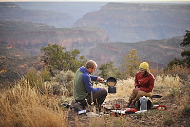 Campers prepare dinner on the North Rim of the Grand Canyon before a hike down into the ditch outside of Fredonia, Arizona November 2011.