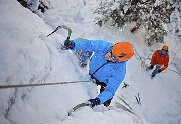 A man climbs a wall of ice in Whistler, British Columbia, Canada, Whistler, British Columbia, Canada