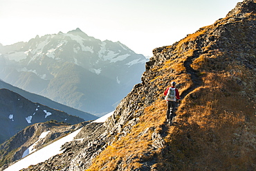 Hiking in the North Cascade Mountains with Mount Shuksan in the background, North Cascades National Park, Washington, United States