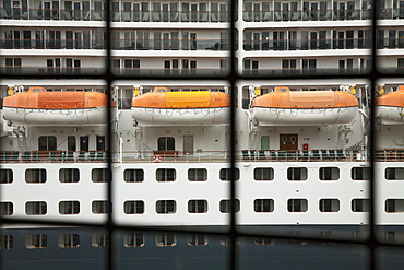 View of cruise ship life rafts through an old window in Oslo, Norway, Oslo, Oslo, Norway