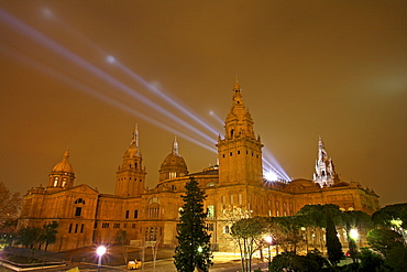 The National Art Museum of Catalonia, also known by its acronym MNAC, is illuminated at night in the city of Barcelona, Spain . Noted for its collection of Romanesque art, considered one of the most complete in the world.