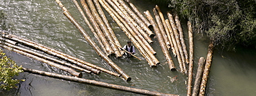 A ganchero was a person dedicated to a craft of assisting in the transport of a large quantity of loose logs floating downstream. by the river Tagus.