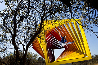 A young man performs different parkour jumps in several locations at the National University (UNAM), in Mexico City