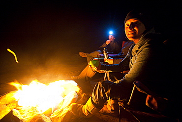 Maria Hidalgo and Dave Steiner enjoys the campfire in Moab, Utah