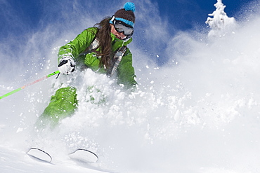 Jenn Berg skiing deep powder at Alta, Utah