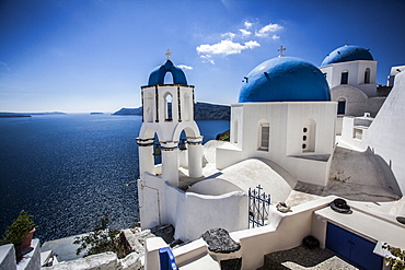 Blue domed rooftops in Santorini, Greece.