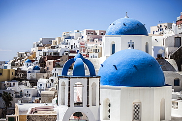 Blue domed rooftops in Santorini, Greece.