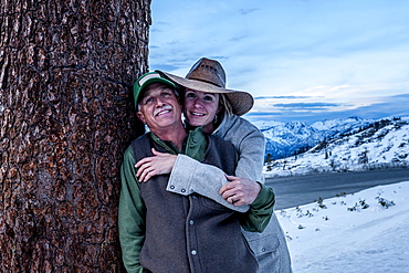 Couple with snowy mountains in the background