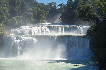 A group of kayakers descending waterfalls in Cascadas de Agua Azul, Chiapas, Mexico.