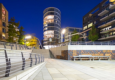 Modern urban architecture on the Dalmankai at night, HafenCity, Hamburg, Germany