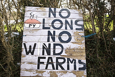 An anti wind turbine board seen in Montgomeryshire in Wales, the United Kingdom.