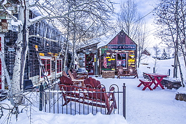 A snow covered coffee shop, Camp 4 Coffee, in the town of Crested Butte, Colorado.