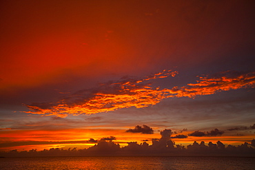 A beautiful sunset full of color as seen from  Playa La Jaula beach, Cayo Coco, Cuba